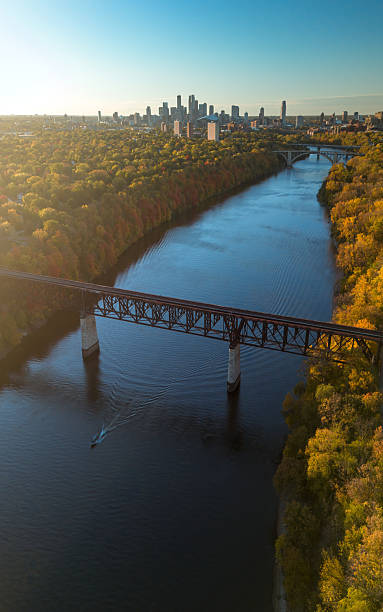 istock Mississippi river Minneapolis skyline at sunset 2241738036