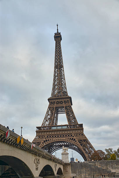 istock The Eiffel Tower in Paris, with a wrought iron structure built for the 1889 World's Fair on a gray day 2241739219