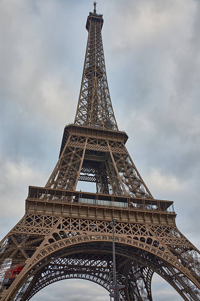 istock The Eiffel Tower in Paris, with a wrought iron structure built for the 1889 World's Fair on a gray day 2241739290