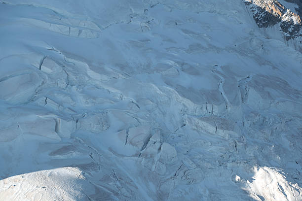 Dramatic patterns of snow and ice on the Mont Blanc massif in early morning