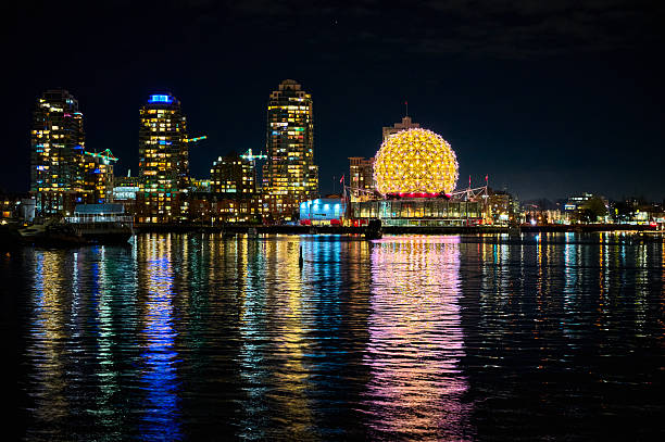 Vancouver, British Columbia, Canada - December 15, 2023.  Illuminated downtown of Vancouver at night
