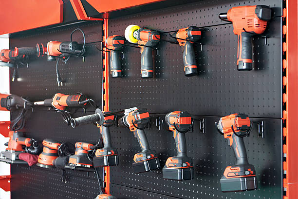 istock Hand tool: screwdriver, drill, angle grinder on stand shop 2241754279
