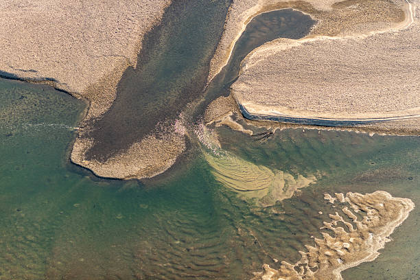 istock Aerial View of River Delta with Sediment Patterns 2241758877