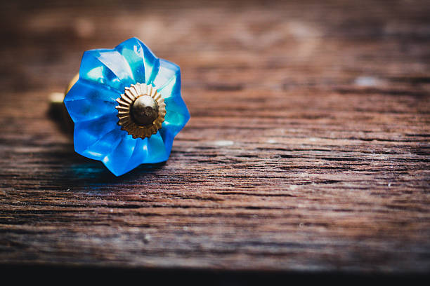 istock Vintage Blue Glass Drawer Pulls on Rustic Wood 2241759592