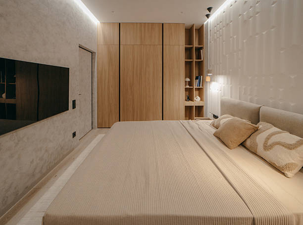 istock Bedroom with a bed, bedside table and lamps 2241764177