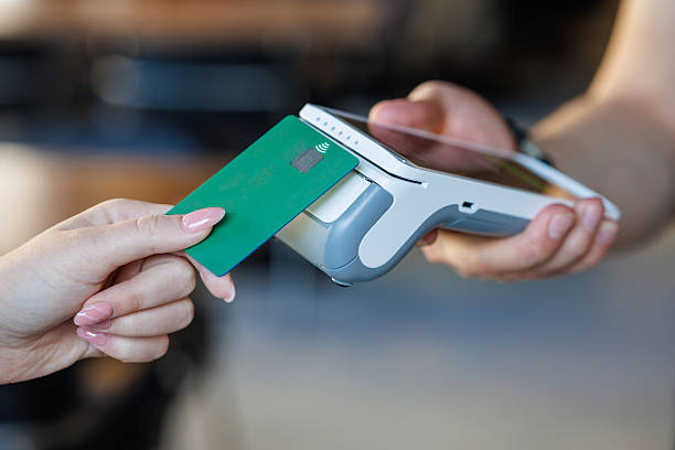 istock Contactless card tap on wireless POS terminal for secure retail checkout 2241764852