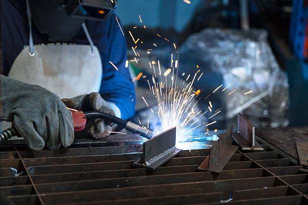 istock Engineer technician staff skill worker working metal parts welding in metal machinery workshop 2241770053