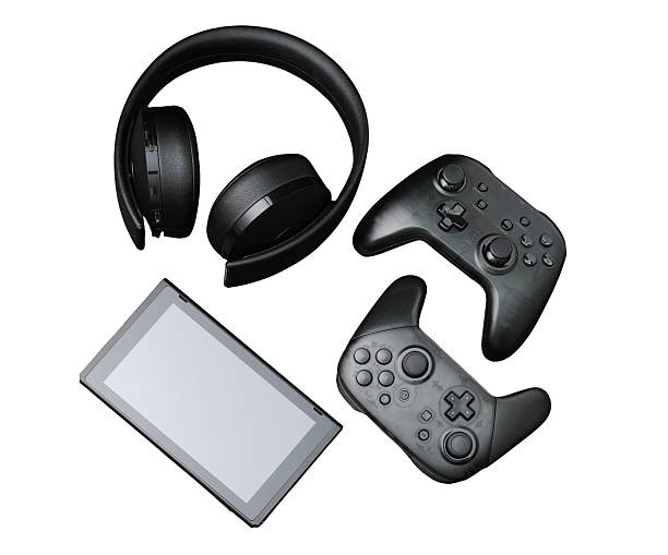 Neon video game devices dark 3d background. VR glasses, joystick controller, portable console, headphones, steering wheel, futuristic button. Metaverse technology render purple banner. 3D illustration