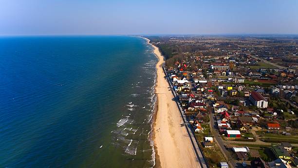 istock Sarbinowo beach and town seen from above in peaceful coastal scenery. 2241775232