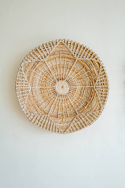 istock Woven wooden wall decoration 2241775479
