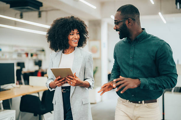 istock Business colleagues talking in the office 2241777496