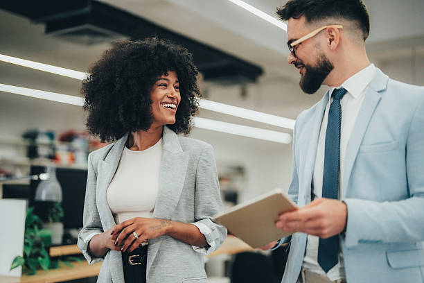 istock Business colleagues talking in the office 2241777497