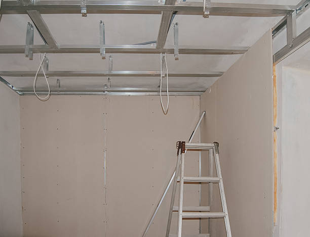 istock Wall cladding with drywall on metal frame and suspended ceiling installation 2241779689