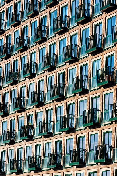 Close-up, abstract view of a modern high-density block of apartments in the Ørestad area of Copenhagen