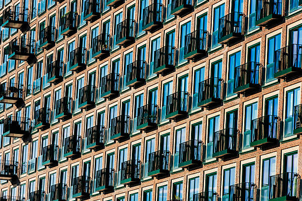 Close-up, abstract view of a modern high-density block of apartments in the Ørestad area of Copenhagen