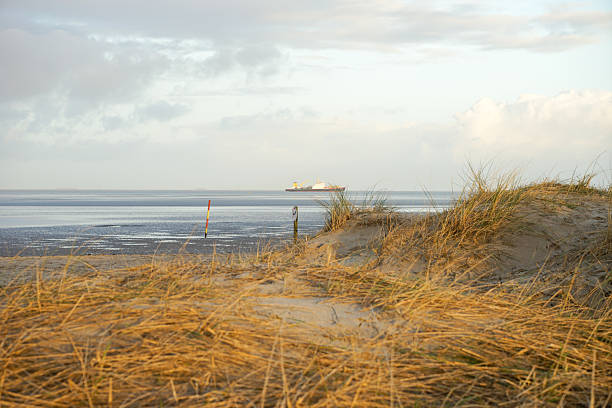 istock A beach with a small boat in the water 2241787083