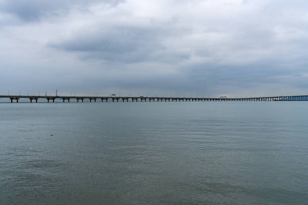 istock idyllic seascape with a long highway bridge 2241787167