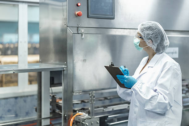 istock Industry inspector team working, QC staff work checking machine operation for safety and hygiene 2241790985