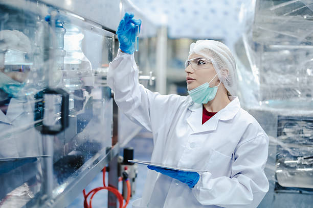 istock Industry inspector team working, QC staff work checking machine operation for safety and hygiene in drink factory 2241791007