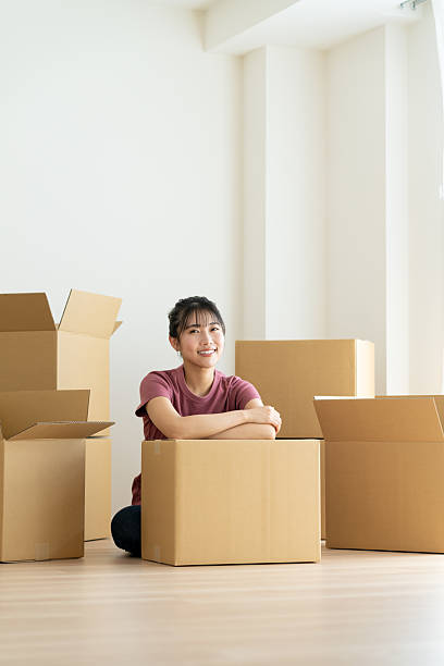 Young woman moving house