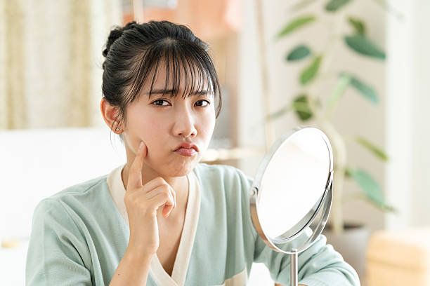 istock Young woman worried about makeup 2241798247