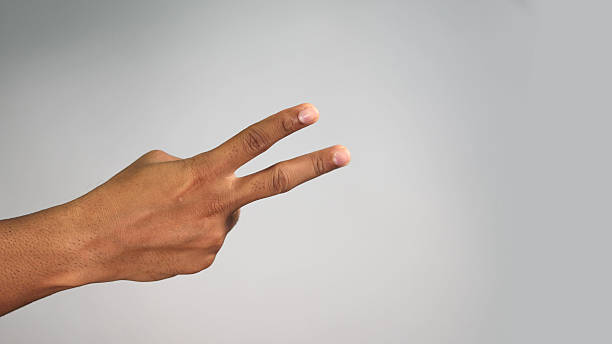 istock Close-Up Hand Gesture  Counting One to Five with Hand for Team Building Concept on Studio Background 2241804392