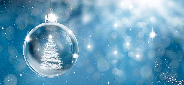 istock Glassy Christmas ball in a snow landscape 2241809638