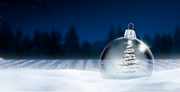 istock Glassy Christmas ball in a snow landscape 2241809674