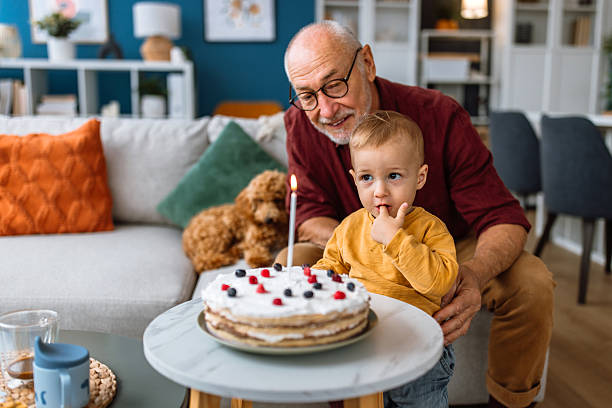 istock Tasting birthday cake for Grandfather's Birthday 2241819191