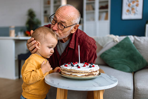 istock Tasting birthday cake for Grandfather's Birthday 2241819259