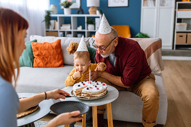 istock Family birthday celebration. Ready for birthday cake. 2241819363