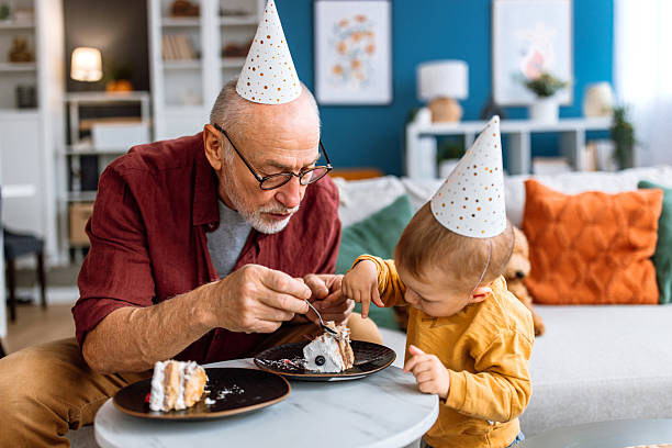 istock Family birthday celebration. Ready for birthday cake. 2241819364
