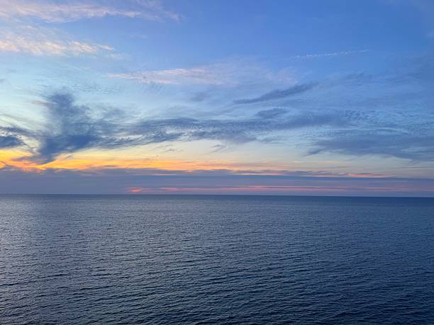 istock Calm sea and dusk sky. 2241819473