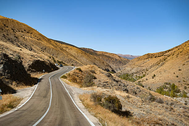 Aerial view on winding mountain road in south Chania region (Crete, Greece).