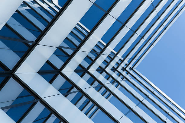 istock Modern Glass Office Building Reflecting Sky 2241830114