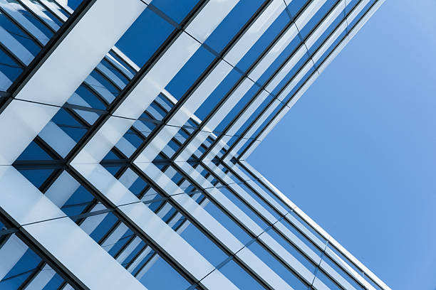 istock Modern Glass Office Building Against Blue Sky 2241830136