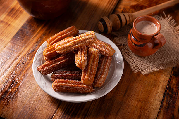 istock churros and hot chocolate christmas Mexico 2241830593
