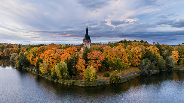 istock Lentvaris manor in golden autumn 2241839735