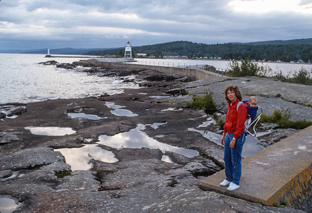 istock Grand Marais - Mother & Son at Breakwater - 1988 2241853218