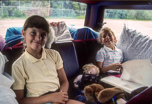 istock Minnesota - Sisters in the Minivan - 1988 2241853263