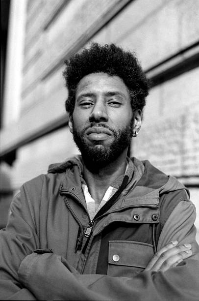 istock Confident afro-american man posing with folded arms in monochrome analog style 2241854645