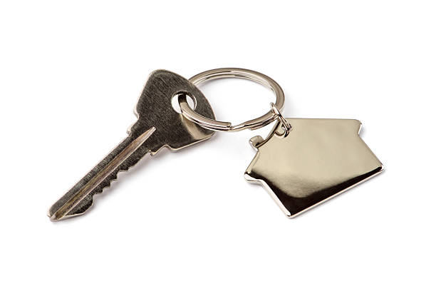 istock Key of house isolated on white 2241855523