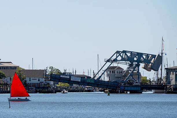 Cat Boat Sailing in Mystic with Drawbridge Partially Open