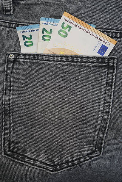 istock Euro banknotes in a jeans pocket 2241856166