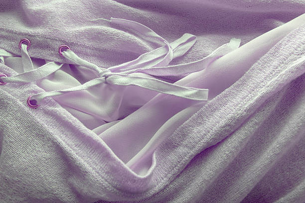 A fabric and mercerized texture background, tulle lace and ribbon lace