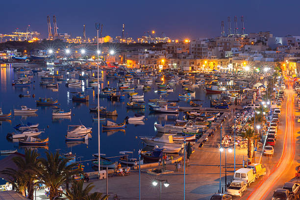 istock Marsaxlokk harbor with boats at night, Malta 2241873230