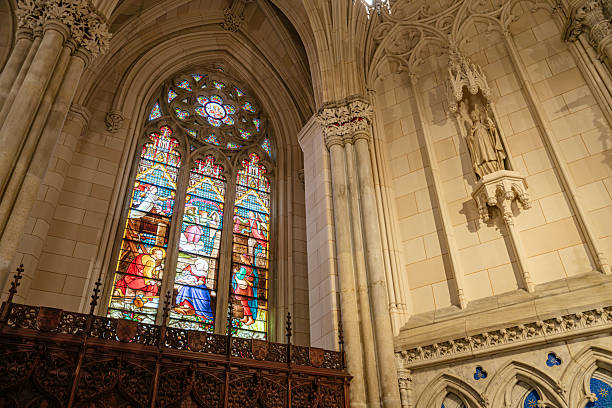 istock Biblical Stained Glass and Wall Sculpture in Cathedral 2241883479