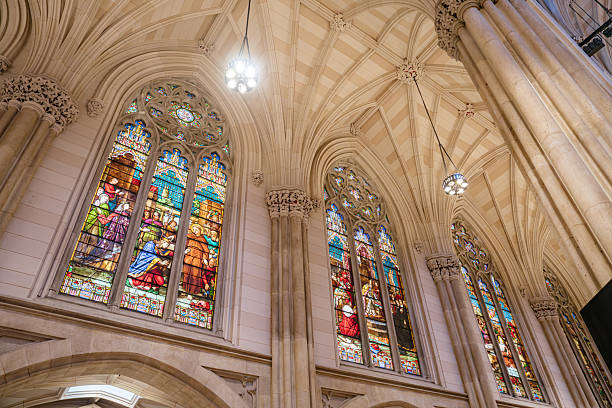 istock Colorful Stained Glass Windows and Vaulted Ceiling in Gothic Cathedral 2241883740