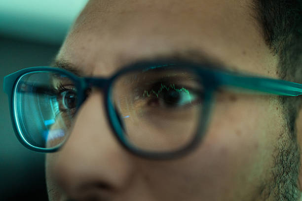 istock Focused Mid Adult Hispanic Male Analyzing Financial Charts on Computer 2241887270