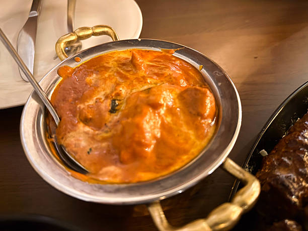 istock Indian butter curry chicken and goat curry in a restaurant 2241898971